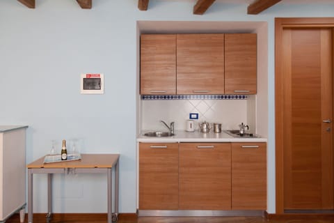 Comfort Room, 1 Bedroom (L'Ancora con Terrazza) | Private kitchen | Fridge, cleaning supplies