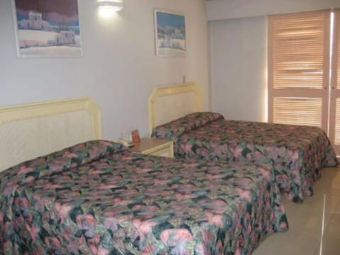 Standard Double Room, 2 Double Beds, Ocean View | In-room safe, desk, rollaway beds, free WiFi