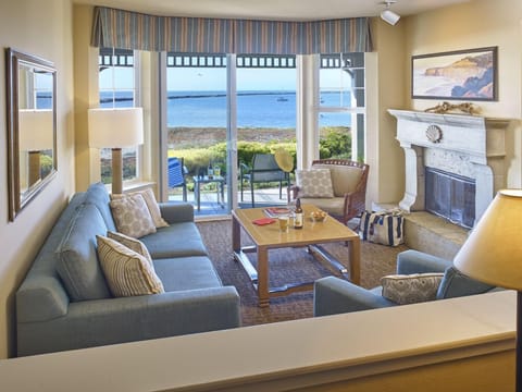 Suite, Ocean View | Living room | Flat-screen TV, fireplace, pay movies