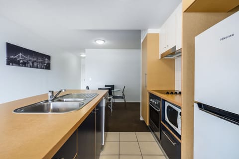 One Bedroom Executive | Private kitchen | Fridge, microwave, stovetop, dishwasher