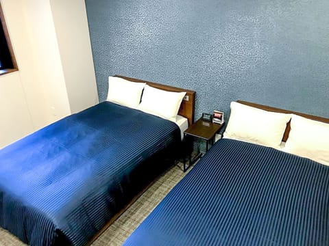 Twin Room, Non Smoking | Individually decorated, desk, free WiFi, bed sheets