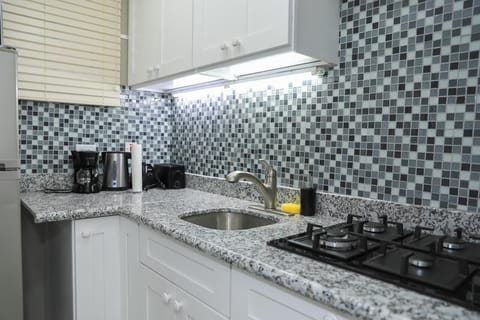 Apartment, Non Smoking | Private kitchen | Full-size fridge, microwave, oven, stovetop