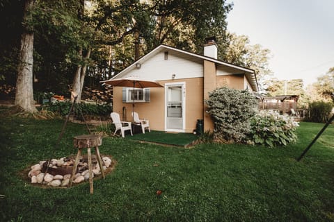 View of Cottage from Parking Area(Cottage has recently been painted Maroon)