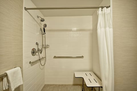 Room, 1 King Bed (Mobility Accessible, Roll-In Shower) | Bathroom | Combined shower/tub, hair dryer, towels