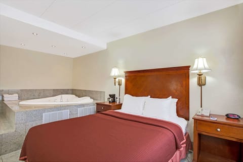 Studio Suite, 1 Queen Bed, Smoking | In-room safe, desk, iron/ironing board, free cribs/infant beds