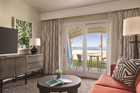 Suite, 1 Bedroom, Sea View | Living area | 55-inch TV with cable channels