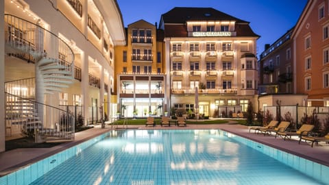 Indoor pool, seasonal outdoor pool, pool umbrellas, sun loungers