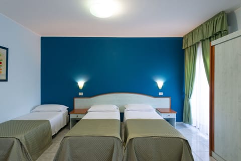 Triple Room | Premium bedding, minibar, in-room safe, desk