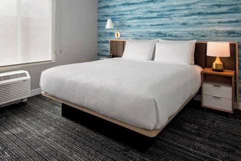 Desk, laptop workspace, blackout drapes, iron/ironing board