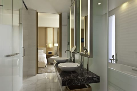 Club Suite, 1 Bedroom, Corner | Bathroom | Combined shower/tub, deep soaking tub, rainfall showerhead