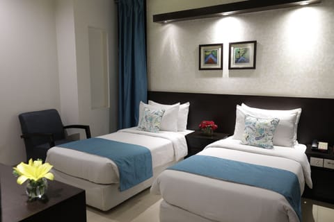 Deluxe Twin Room | Premium bedding, in-room safe, individually decorated, desk