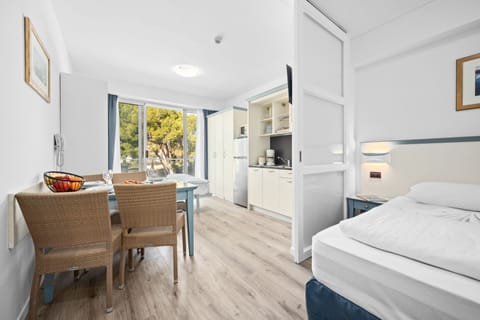 Family Apartment, 1 Bedroom, Balcony | Living area | TV, table tennis