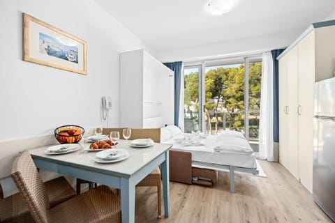 Family Apartment, 1 Bedroom, Balcony | Living area | TV, table tennis