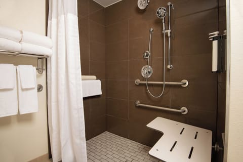 Designer toiletries, hair dryer, towels