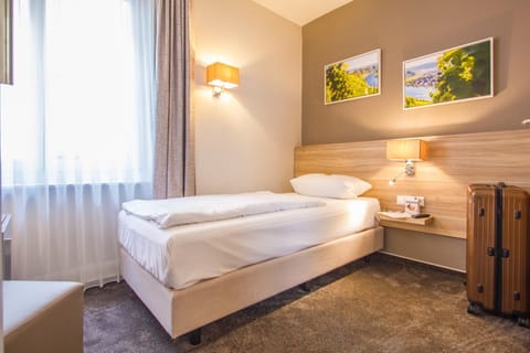 Single Room | Premium bedding, minibar, in-room safe, soundproofing