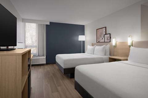 Room, 2 Queen Beds | Desk, laptop workspace, iron/ironing board, free cribs/infant beds