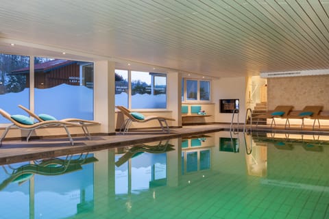 Indoor pool, open 7:00 AM to 8:00 PM, sun loungers