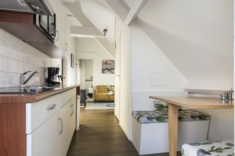 Apartment | Private kitchen | Full-size fridge, microwave, stovetop, coffee/tea maker