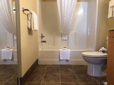 Combined shower/tub, hair dryer, towels, soap