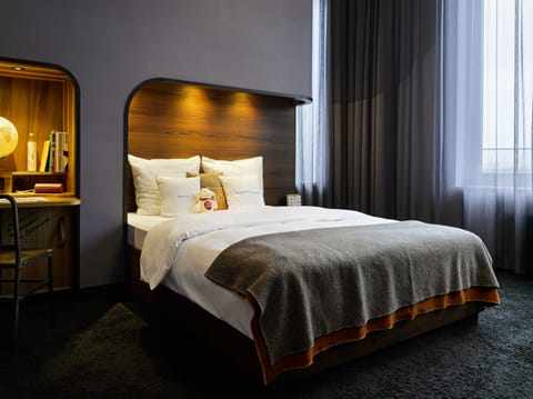 Medium | Premium bedding, down comforters, free minibar, in-room safe
