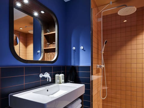 Medium Plus | Bathroom | Shower, rainfall showerhead, designer toiletries, hair dryer