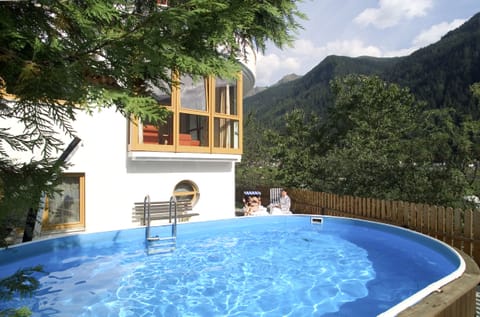 Seasonal outdoor pool, pool umbrellas, sun loungers