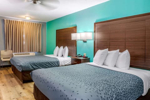 Room, 2 Queen Beds, Non Smoking, Poolside | Iron/ironing board, free WiFi, bed sheets