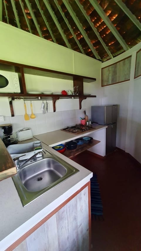 Honeymoon Bungalow, Beachside | Private kitchen | Microwave, stovetop, electric kettle, cookware/dishes/utensils