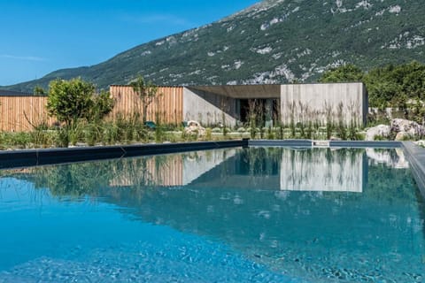 Seasonal outdoor pool, open 8:00 AM to 7:00 PM, sun loungers