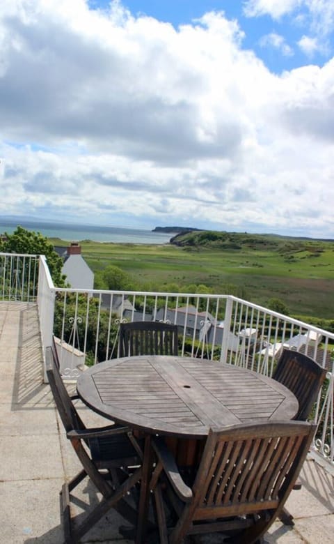 Balcony outdoor eating off the kitchen & sitting rooms.