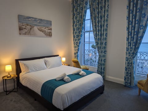 Superior Double Room, Beach View | Iron/ironing board, bed sheets