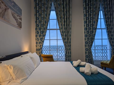 Superior Double Room, Beach View | Iron/ironing board, bed sheets