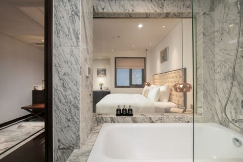 Superior Internal Window | Bathroom | Designer toiletries, hair dryer, bathrobes, slippers