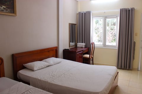 Standard Quadruple Room | Minibar, desk, iron/ironing board, free WiFi