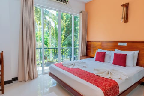 Deluxe Room, Balcony | Premium bedding, in-room safe, individually decorated