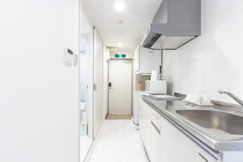 Suite | Private kitchen | Fridge, microwave, stovetop, electric kettle