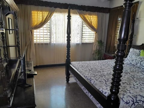 Basic Room, 1 King Bed, Pool View | Pillowtop beds, in-room safe, individually decorated, blackout drapes
