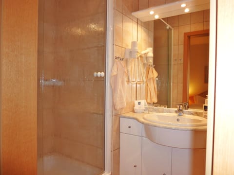 Comfort Double Room, Patio | Bathroom | Shower, hair dryer, towels, soap