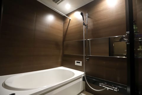 Standard Family Room | Bathroom | Separate tub and shower, deep soaking tub, free toiletries, hair dryer