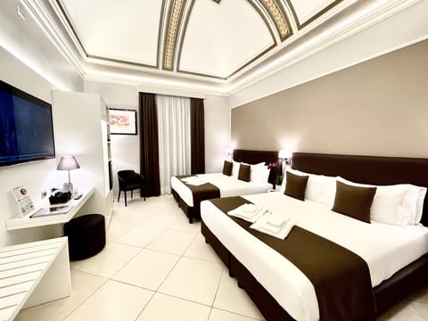 Deluxe Quadruple Room, Multiple Beds, City View | Premium bedding, memory foam beds, minibar, in-room safe