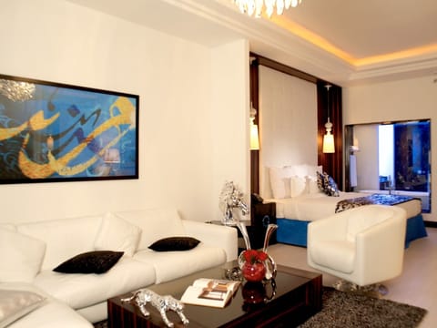 Junior Double Room, 1 King Bed | Living area | LED TV