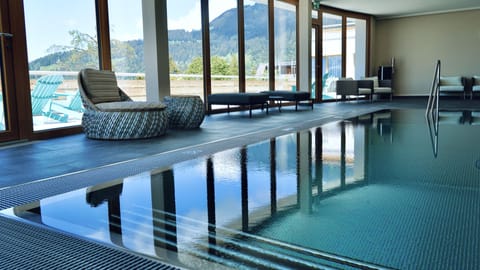 Indoor pool, open 9:00 AM to 9:00 PM, sun loungers