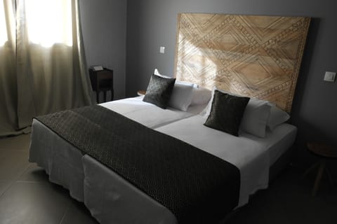 Apartment, 3 Bedrooms (Convivial) | Premium bedding, minibar, in-room safe, individually decorated