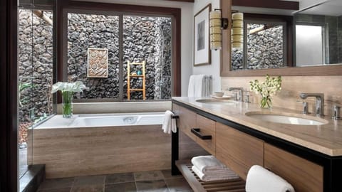 Separate tub and shower, jetted tub, designer toiletries, hair dryer