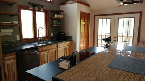 Fully equipped kitchen with modern appliances.