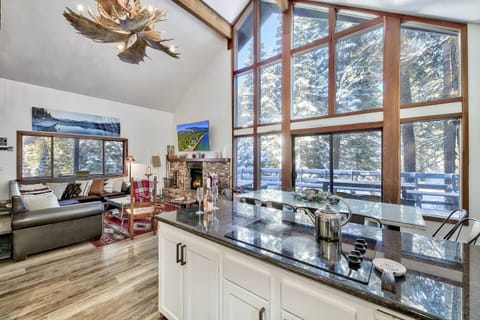 Dining room area, living room and renovated kitchen.