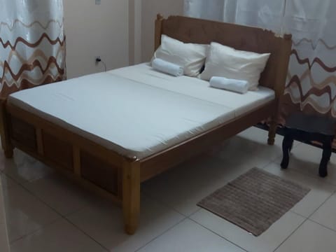 Apartment, 4 Bedrooms, Ocean View | Laptop workspace, iron/ironing board, free WiFi, bed sheets