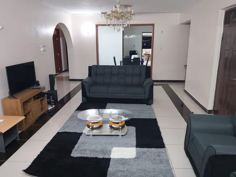 Apartment, 4 Bedrooms, Ocean View | Living room | 42-inch LED TV with cable channels, TV, DVD player