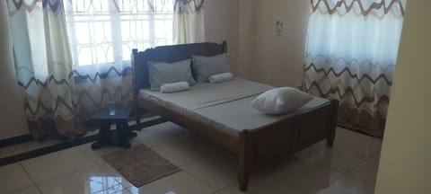 Apartment, 4 Bedrooms, Ocean View | Laptop workspace, iron/ironing board, free WiFi, bed sheets