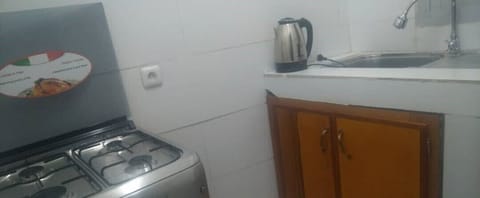 Classic Apartment | Private kitchen | Fridge, microwave, oven, stovetop